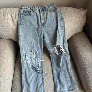 High waisted distressed blue denim jeans